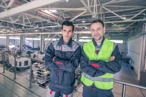 Workers in factory Stock Photos