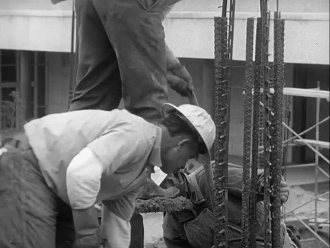 Workers find out the mental condition of a fellow worker - 1958 Stock Footage 97228822