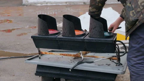 Workers fix the lights of a broken traffic light Stock Footage 168496012