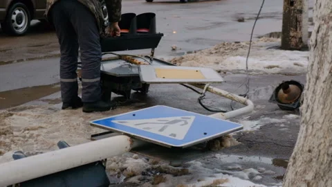 Workers fix the lights of a broken traffic light Stock Footage 168496079