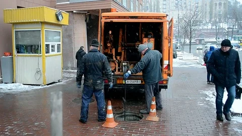 Workers fixing the cable near TSUM Central Department Store in Kiev, Ukraine. Stock Footage 72079890