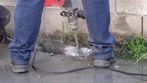 Workers Fixing A Water Leak And Using A Jack Hammer To Break The Cement Stock Footage 204094840