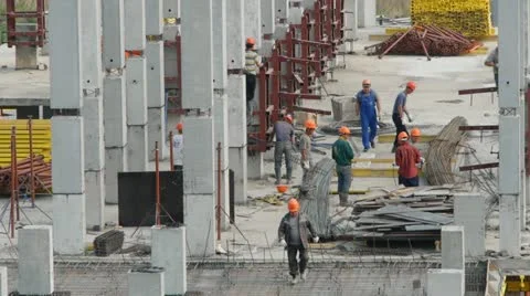 Workers on floor of under construction building Stock Footage 11144305