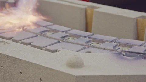 Workers in a foundry burning a sand cast Stock Footage 98738538