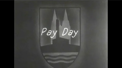 Workers get paid at a factory in 1935. Stock Footage