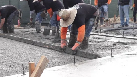 Workers getting concrete floor done Stock-Footage 228794763