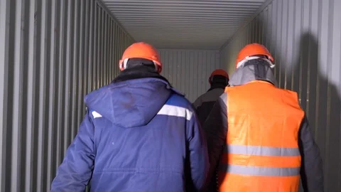  Workers go back to the camera. Stock Footage 105228381