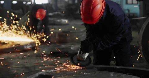 Workers grind and cut metal sparks Stock-Footage 111866954