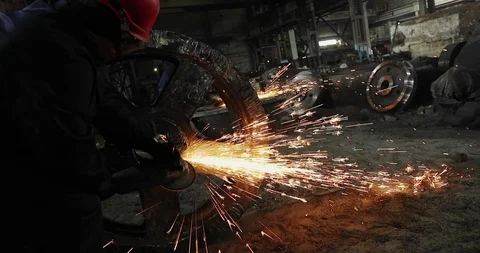 Workers grind and cut metal sparks Stock-Footage 111867032