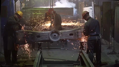 Workers Grinding Big Steel Structure For Train Manufacturing At industrial Plant Stock Footage 167402364