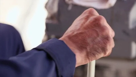 Workers hand contols the crane. Camera closeup inside the cabin. Stock Footage 70208337