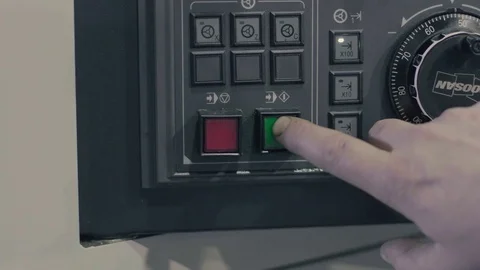 The worker's hand switching on start button Video stock 74246989