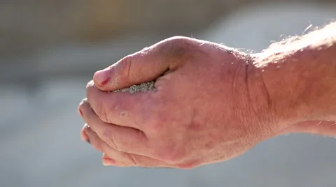 Workers hands dropping sand Stock Footage 50218005