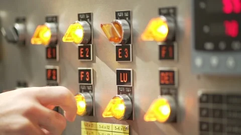Worker's hands on factory switcher with buttons. Stock Footage 111774601