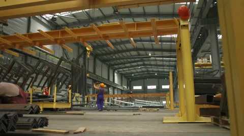 Workers hangs metal corner on crane Stock Footage 34830594