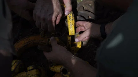 Workers have difficulty staring at the hook of a crane. Detail. Stock Footage 65886605