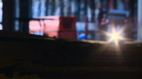 Workers in Helmets Accept Lower the Load in the Distance. Construction of the Stock Footage 63441544
