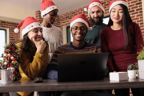 Workers helping to finish task on xmas Foto stock
