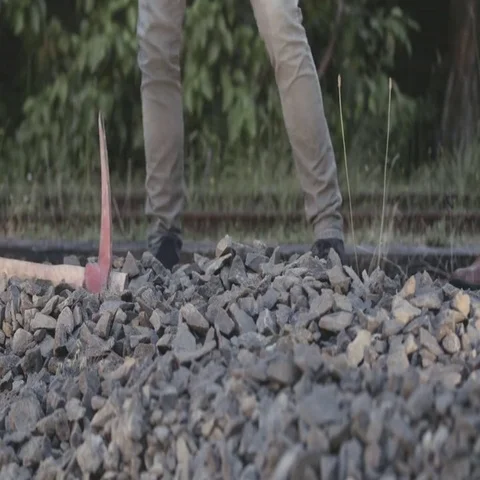 Workers hitting rocks Stock Footage 69722138