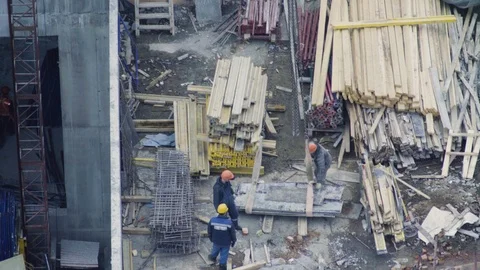 Workers hooking the plates to the crane. Stock Footage 88787550
