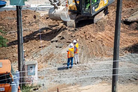 Workers inspecting an infrastructure construction site Stock Photos
