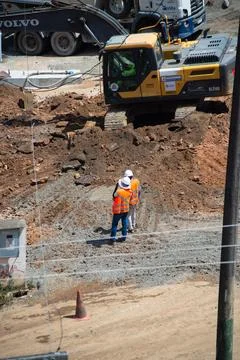 Workers inspecting an infrastructure construction site Stock Photos
