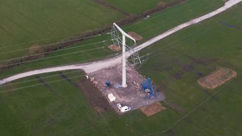 Workers inspecting Pylon Stock Footage 171870592