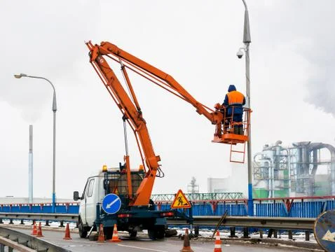 Workers install video surveillance system Stock Photos