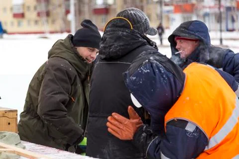 Workers on the installation of the ice town 스톡 사진