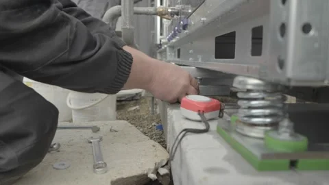 Workers installing engineering equipment on the roof Stock Footage 289471080