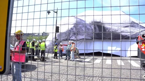 Workers Installing Monumental JR Art Piece Over Pont Neuf Bridge in Paris Stock Footage 336187464