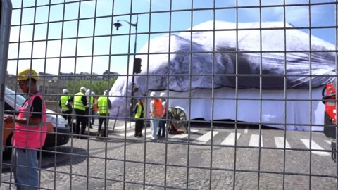 Workers Installing Monumental JR Art Piece Over Pont Neuf Bridge in Paris Stock Footage 336450042