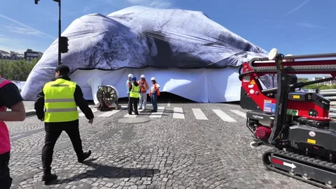 Workers Installing Monumental JR Art Piece Over Pont Neuf Bridge in Paris Stock Footage 336460130