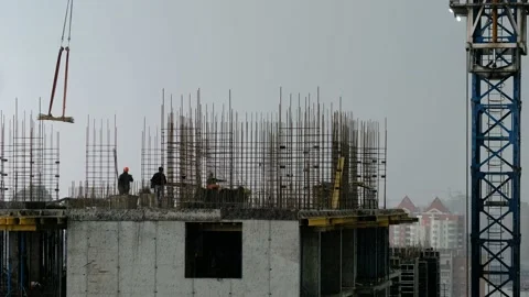 Workers installing reinforcement and formwork. Crane work at construction site 스톡 동영상 139289651