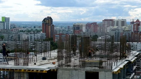 Workers installing reinforcement and formwork. Crane work at construction site Stock Footage 146502255
