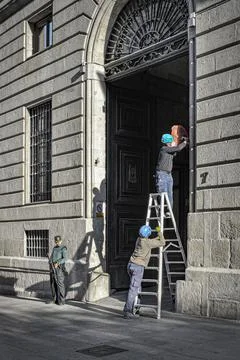 Workers with ladder Stock Photos