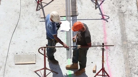 Workers On a Large Construction Site Stock Footage 72117129