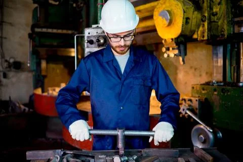 Workers with lathe Stock Photos