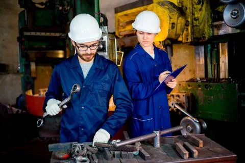 Workers with lathe Stock Photos