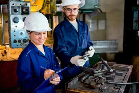 Workers with lathe Stock Photos
