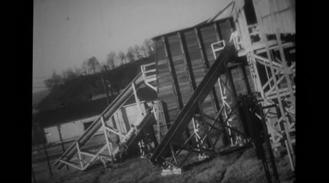 Workers leaving building by sliding down chute Stock Footage 37593907