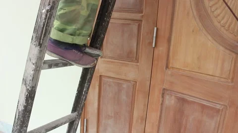 The workers' legs are climbing high Stock Footage 67317797