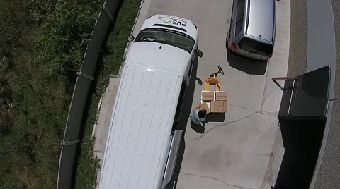 Workers load cargo in car Stock Footage 41339777