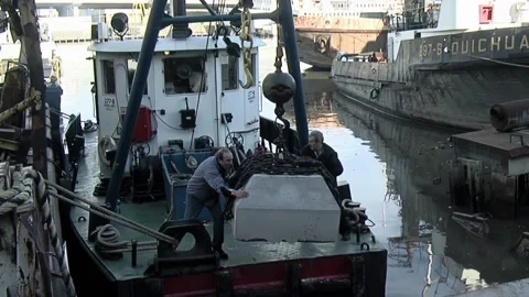 Workers Loading Anchor Block on Ship at Port of Buenos Aires, Argentina Stock Footage 153446667