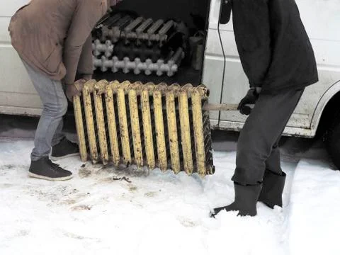 Workers Loading Radiators Stockfoto's