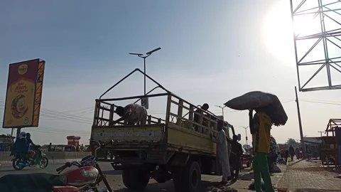 Workers Loading Recyclable Plastic Sacks Into Truck Kano Nigeria 動画素材 331072724