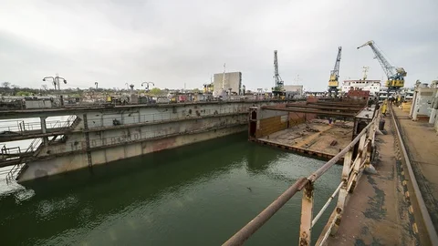 Workers make the docking of the ship in the dock. Stock Footage 86239250