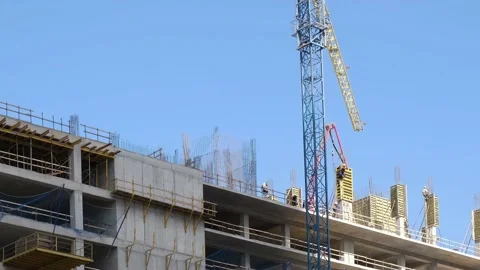 Workers make a strapping of rebar for pouring concrete. Stock Footage 235510075