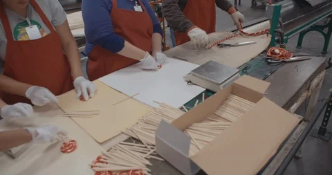 Workers Making Lollipops In Slow Motion 스톡 동영상 105349563