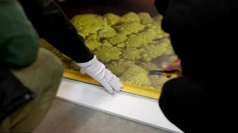 Workers measuring with a ruler drywall panel and then cut him with a knife Stock Footage 68454038